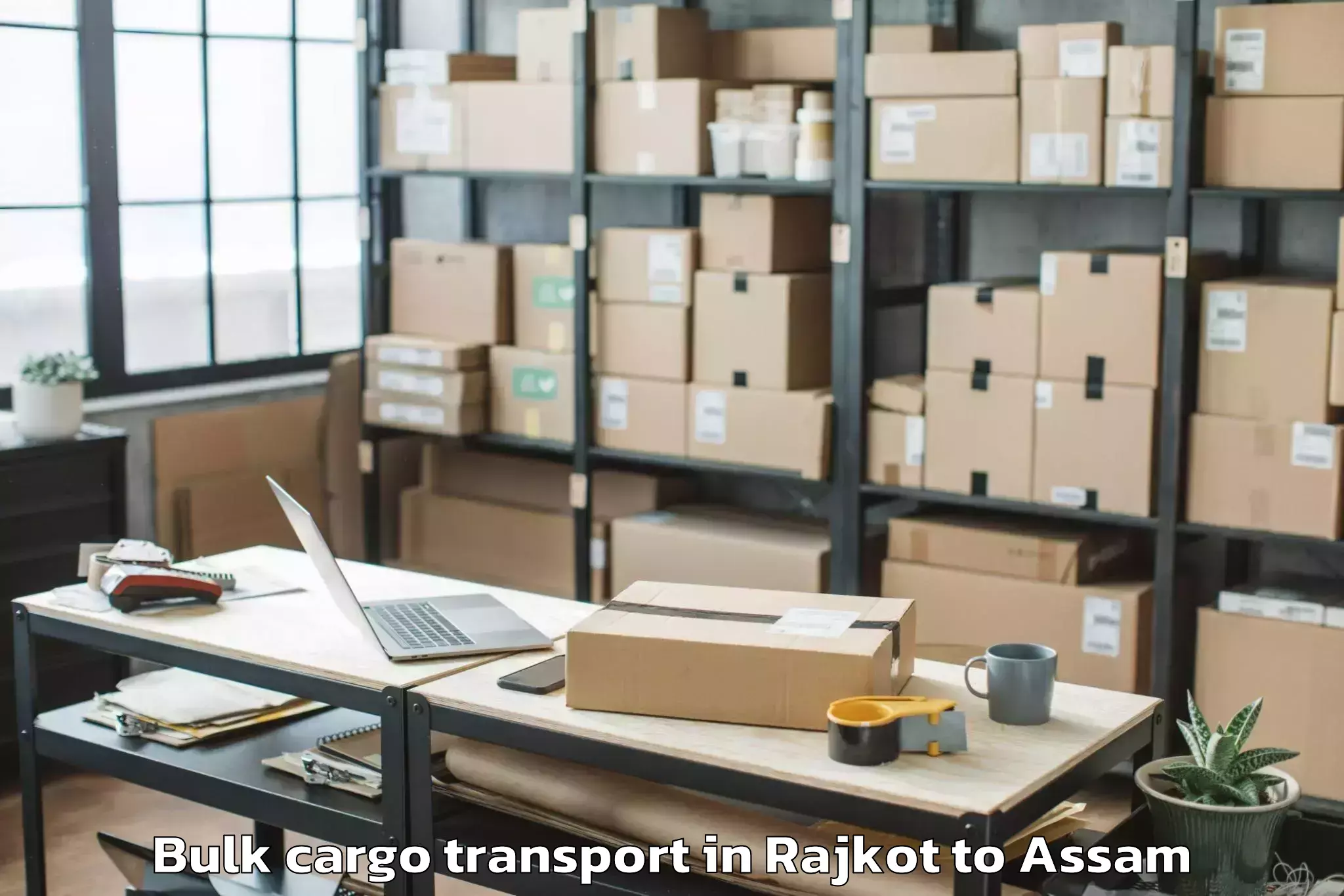 Quality Rajkot to Dhakuakhana Bulk Cargo Transport